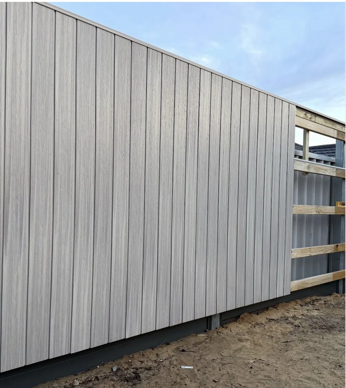 NewTechWood US31 Sea Salt composite cladding going up on a Perth build supplied by Integrity