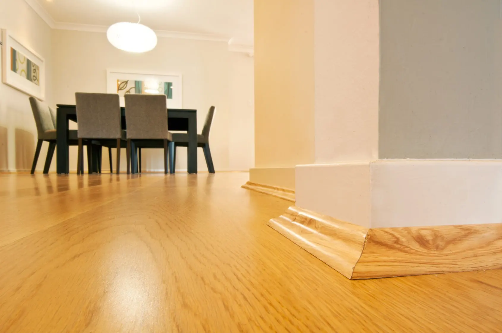 Hume DAR dressed-all-round skirting meeting an oak floor